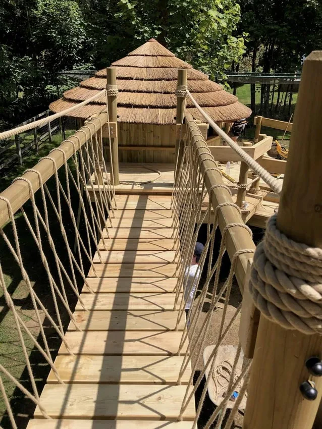 tree house with rope bridge