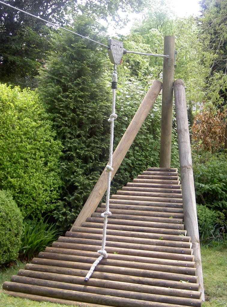 A large garden zip wire rope and timber platform in a mature garden in Sheffield, UK.